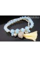 Bracelet bleu pompon